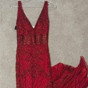Long red formal dress with bejeweled lace